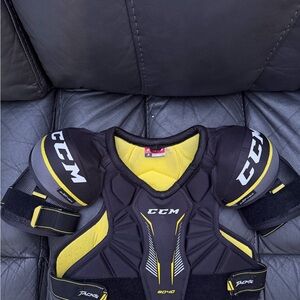 CCM Black and Yellow Hockey Shoulder Pads